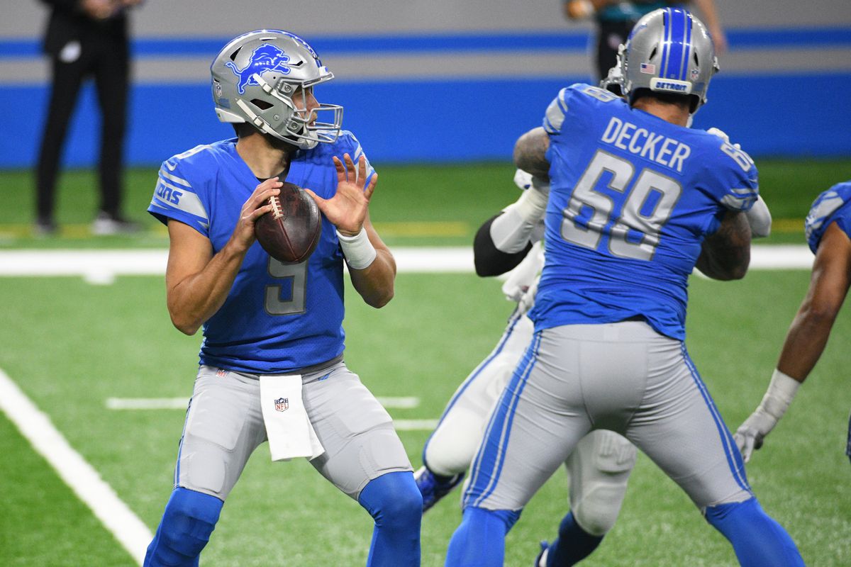 Detroit Lions quarterback Matthew Stafford (9) drops back to pass during the first quarter against the Indianapolis Colts at Ford Field.