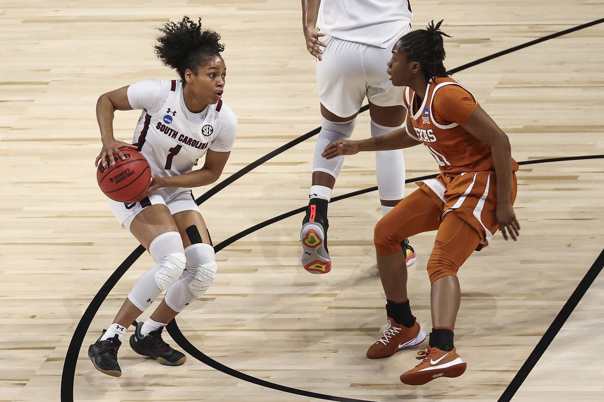 South Carolina Gamecocks guard Zia Cooke controls the ball while defended by Texas Longhorns forward Lauren Ebo during the first quarter at Alamodome.