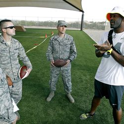 NFL Pro Bowler Mario Williams speaks with Air Force members during the Airman for a Day event sponsored by USAA, the Official Military Appreciation Sponsor of the NFL on Wednesday, January 21, 2015 in Glendale, Arizona.
