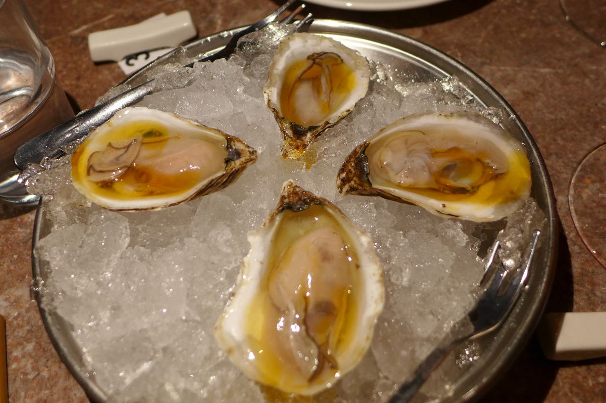 Oysters on the half shell on crushed ice.