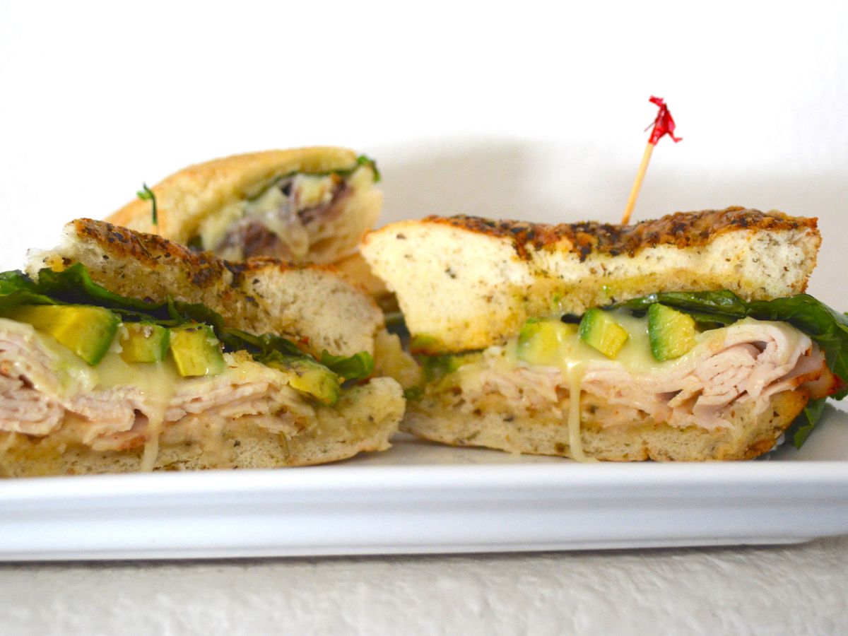 Focaccia sandwich with turkey, cheese, and avocado