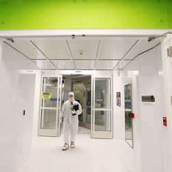IM Flash Technologies employee leaves the clean room in Lehi Friday, Feb. 20, 2015. 