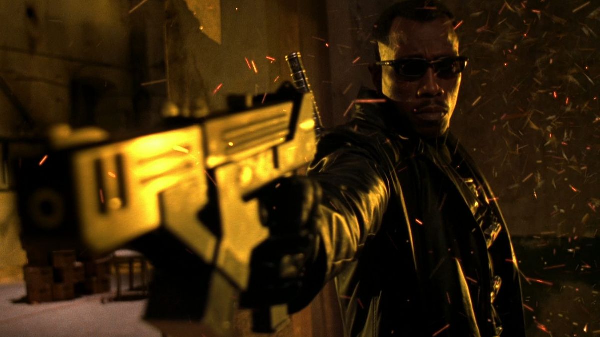 Blade holding a pistol in Blade 2.