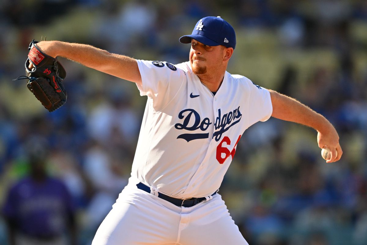Los Angeles Dodgers relief pitcher Caleb Ferguson (64) pitches in the ninth inning against the Colorado Rockies at Dodger Stadium. Mandatory Credit: Jayne Kamin-Oncea