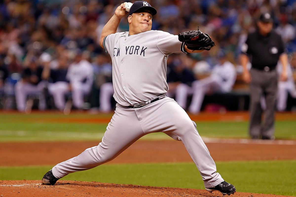 ST PETERSBURG, FL - SEPTEMBER 27:  Pitcher Bartolo Colon #40 of the New York Yankees pitches against the Tampa Bay Rays during the game at Tropicana Field on September 27, 2011 in St. Petersburg, Florida.  (Photo by J. Meric/Getty Images)