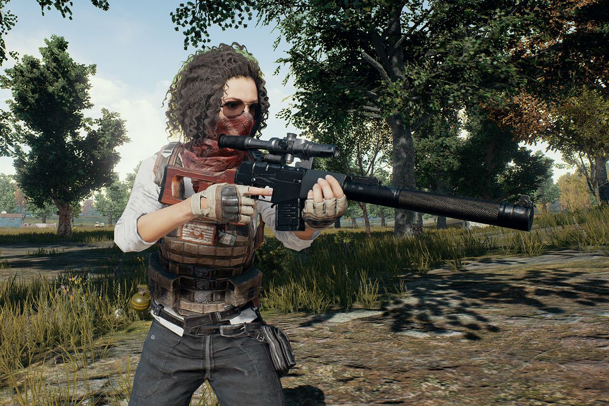 A masked character with cool sunglasses points a rifle off screen