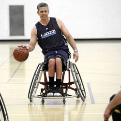 Jeff Griffin races down the court to the other basket during practice with his teammates at Salt Lake Community College's Lifetime Activities Center on Feb. 20.