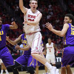 Utah Utes forward Tyler Rawson (21) passes the ball during a men's basketball game against the LSU Tigers at the Huntsman Center in Salt Lake City on Monday, March 19, 2018. Utah won 95-71.