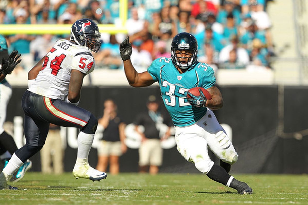 JACKSONVILLE FL - NOVEMBER 14:  Maurice Jones-Drew #32 of the Jacksonville Jaguars runs the ball during a game against the Houston Texans at EverBank Field on November 14 2010 in Jacksonville Florida.  (Photo by Mike Ehrmann/Getty Images)