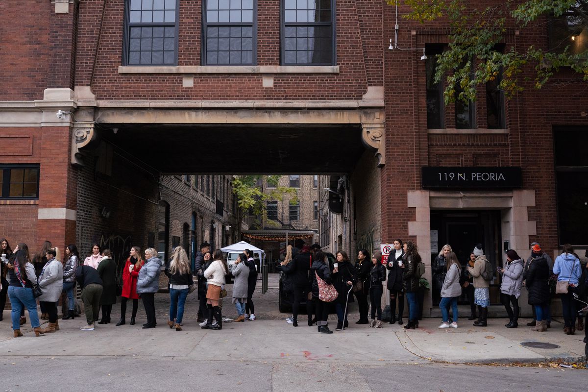 People line up for the opening of Uncommon James on Saturday morning at 849 W. Randolph in the West Loop.