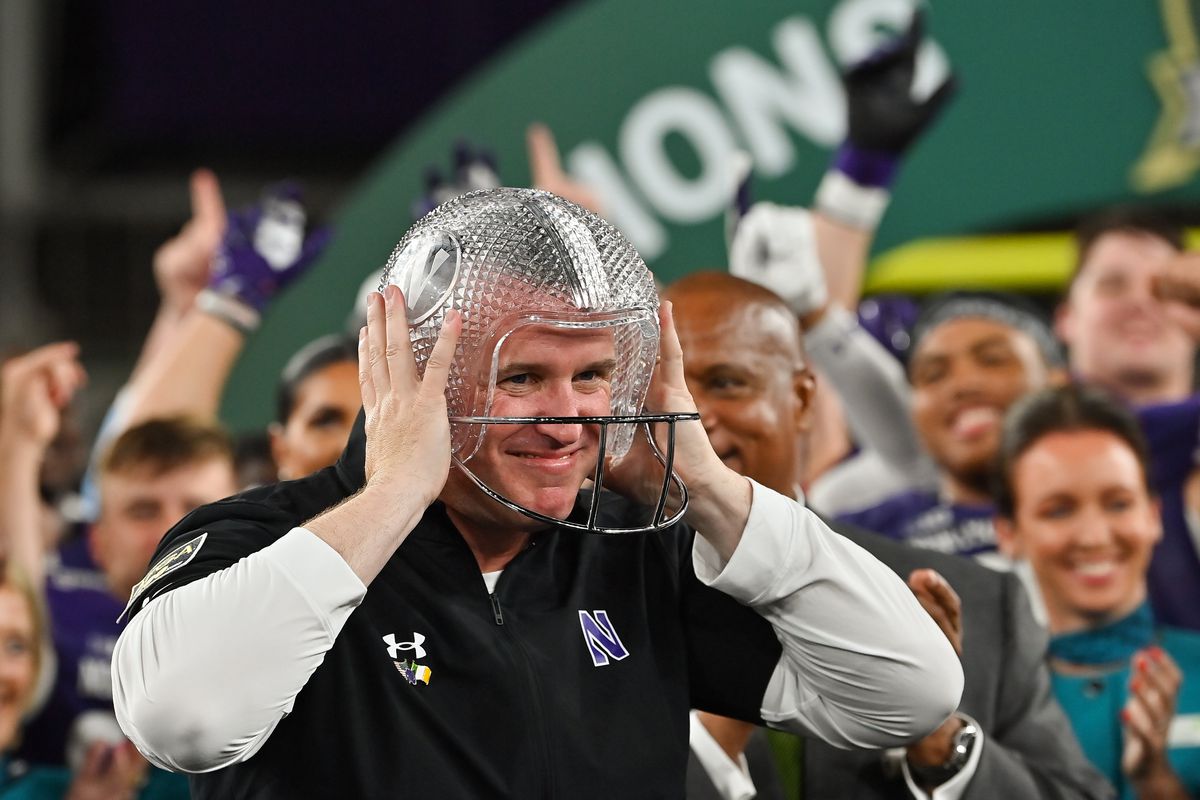 Northwestern Wildcats head coach Pat Fitzgerald celebrates after defeating the Nebraska Cornhuskers in the Aer Lingus college football series at Aviva Stadium.