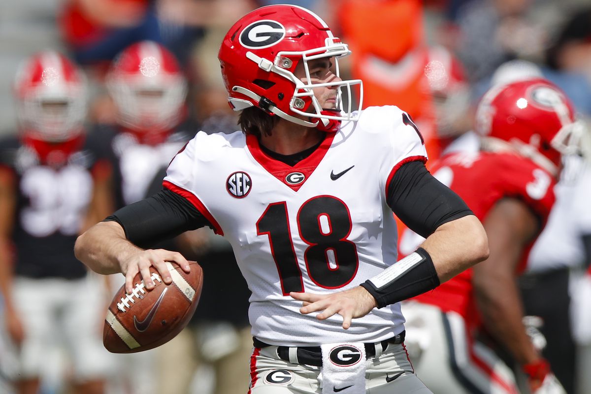 Quarterback JT Daniels of the Georgia Bulldogs drops back to pass during the second half of the G-Day spring game at Sanford Stadium on April 17, 2021 in Athens, Georgia.