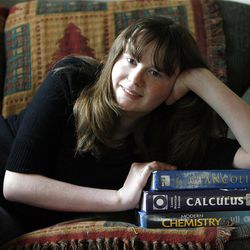 Rebecca Nickerson, a 10th-grader at West High School, achieved a perfect score on her ACT. She poses in her home in Salt Lake City.