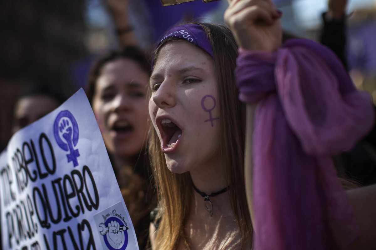Women march as they shout slogans during the International Women’s Day in Barcelona, Spain, Friday, March 8, 2019. Spanish women are marking International Women’s Day with a full day strike and dozens of protests across the country against wage gap and ge
