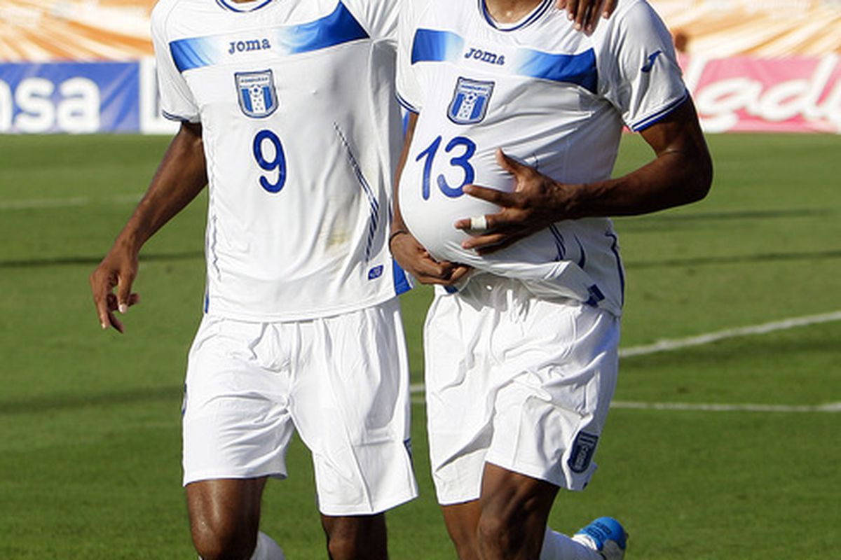 HOUSTON - MAY 29: Carlo Costly #13 of Honduras and Jerry Bengston #9 celebrate after Costly's goal in the first half against Honduras at Robertson Stadium on May 29, 2011 in Houston, Texas. (Photo by Bob Levey/Getty Images)