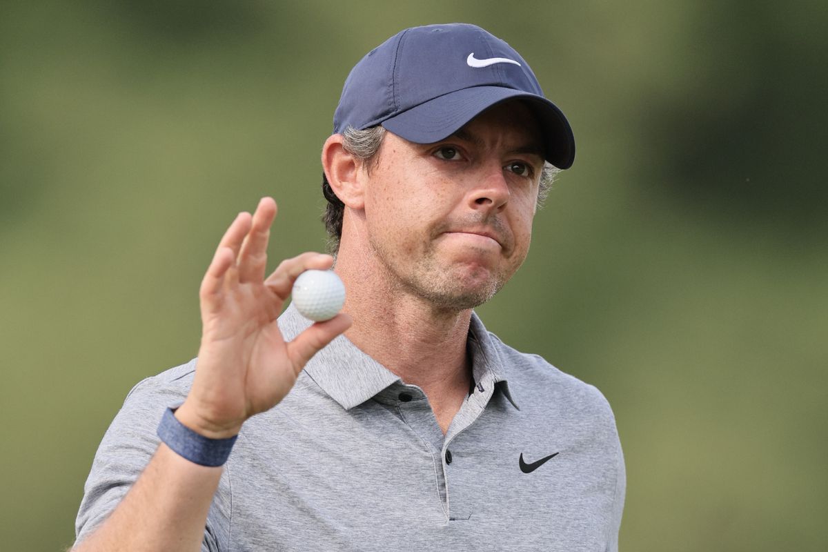 Rory McIlroy of Northern Ireland acknowledges fans after a putt on the 18th green during the third round of the Memorial Tournament presented by Workday at Muirfield Village Golf Club on June 03, 2023 in Dublin, Ohio.