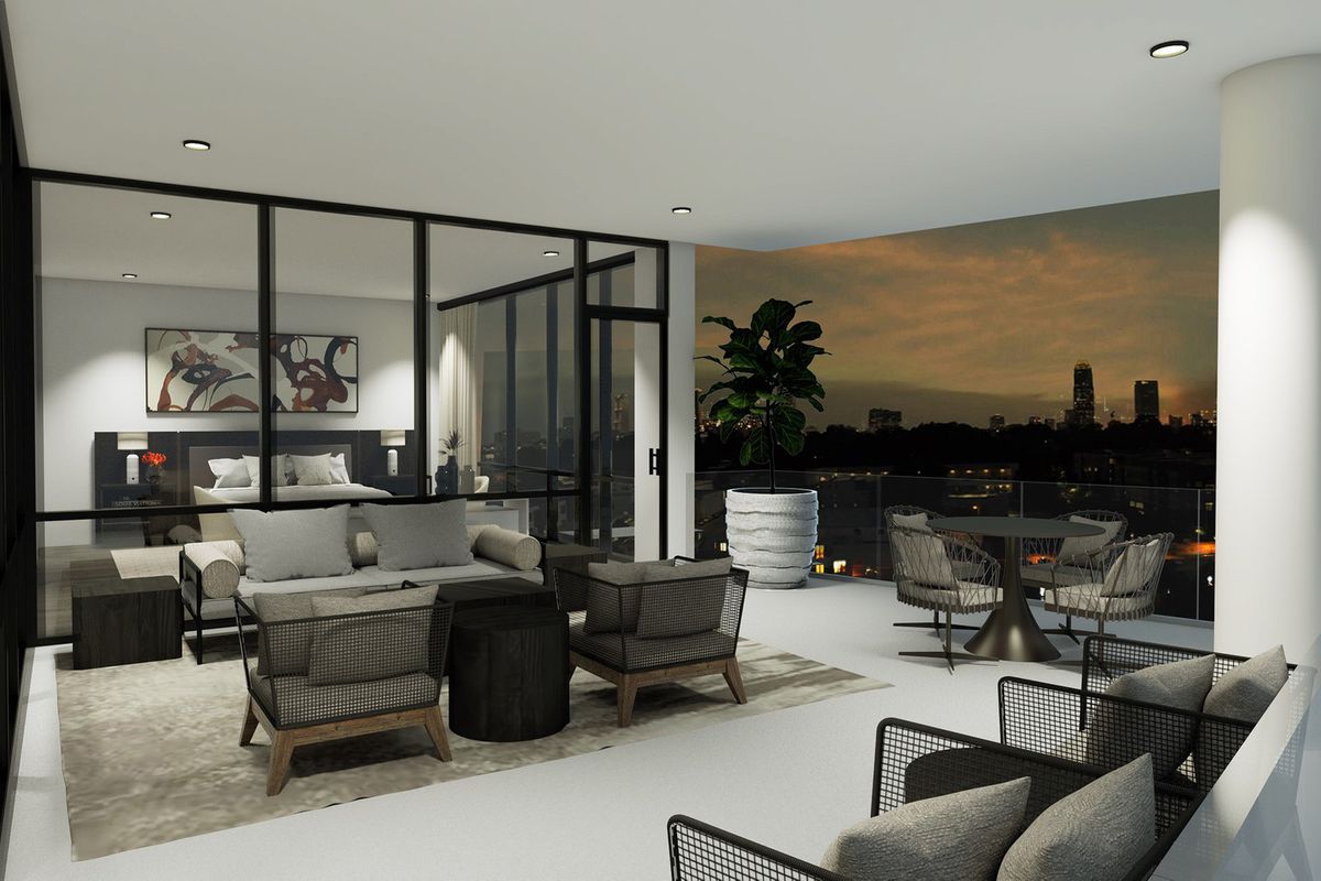 A condo shown in rendering with a huge terrace, bedroom, and city in the distance.