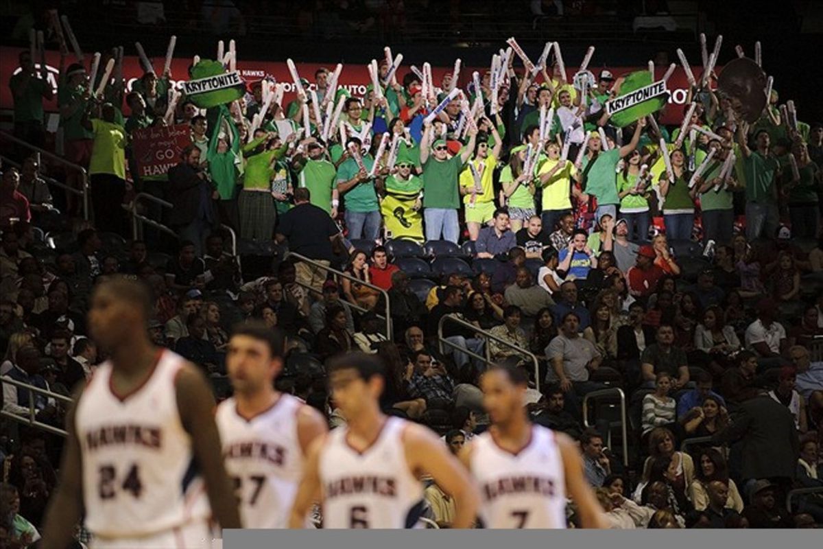 Feb 23, 2012; Atlanta, GA, USA; Atlanta Hawks fans celebrate against the Orlando Magic at Phillips Arena. Mandatory Credit: Paul Abell-US PRESSWIRE
