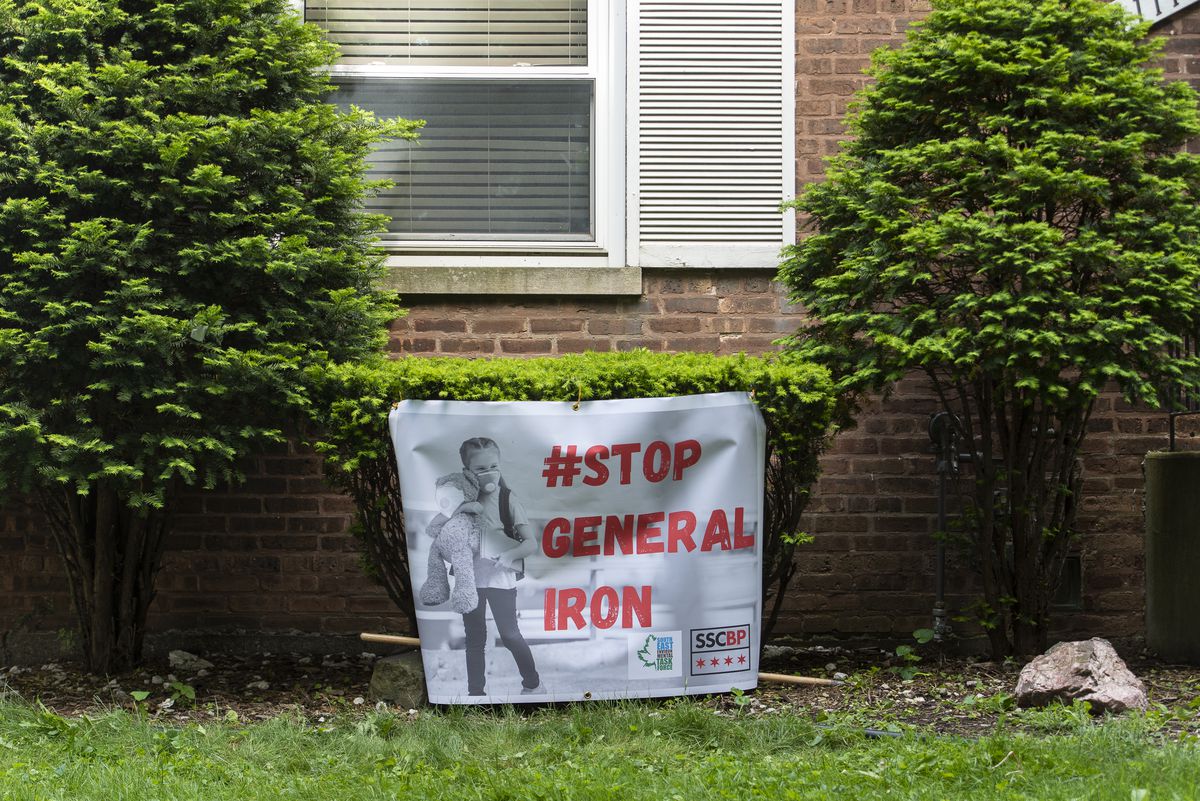 A stop General Iron sign sits in front of Gina Ramirez’s home in the southeast side of Chicago, Thursday, May 28, 2020. Ramirez like many others in her neighborhood are concerned about General Iron wanting to open a new metal shredding plant near where she lives. | Tyler LaRiviere/Sun-Times
