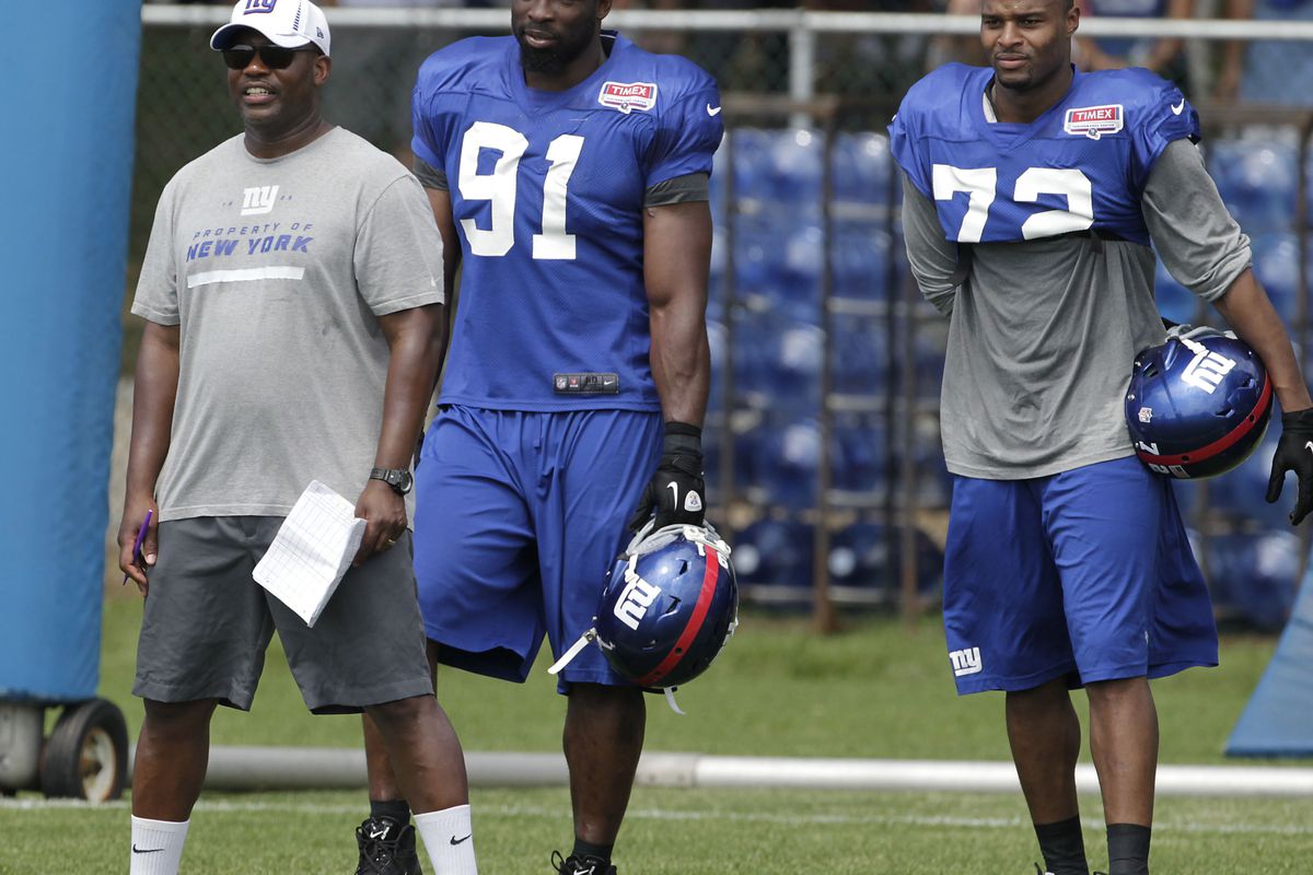 Justin Tuck (91) and Osi Umenyiora (72) during practice on Monday. Farrell/THE STAR-LEDGER via US PRESSWIRE