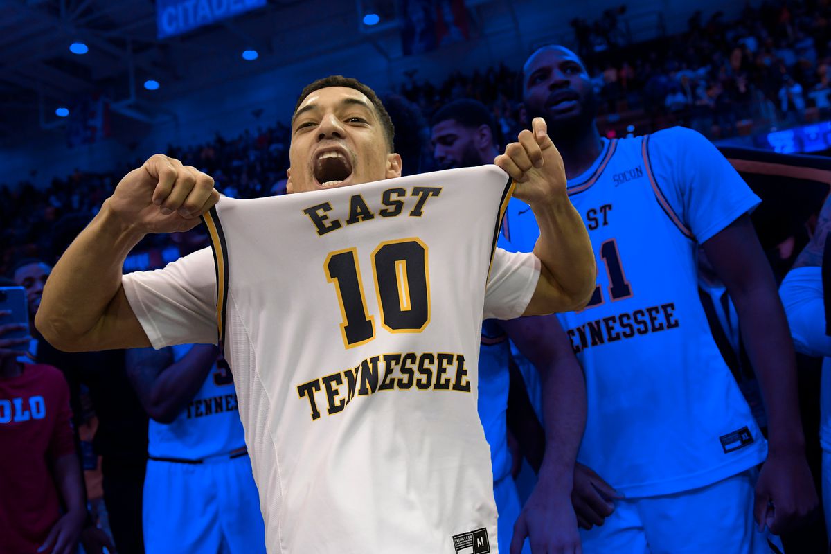 East Tennessee State basketball celebrates.