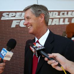 FILE - Athletics Director Chris Hill talks to the media at the grand opening of the new Spence and Cleone Eccles Football Center at the University of Utah in Salt Lake City on Thursday, Aug. 15, 2013.