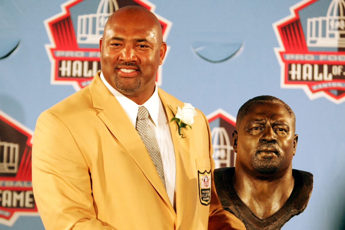 August 4, 2012; Canton, OH, USA; Pittsburgh Steelers former center Dermontti Dawson poses with his bust during the 2012 Pro Football Hall of Fame enshrinement ceremonies at Fawcett Stadium. Mandatory Credit: Charles LeClaire-US PRESSWIRE