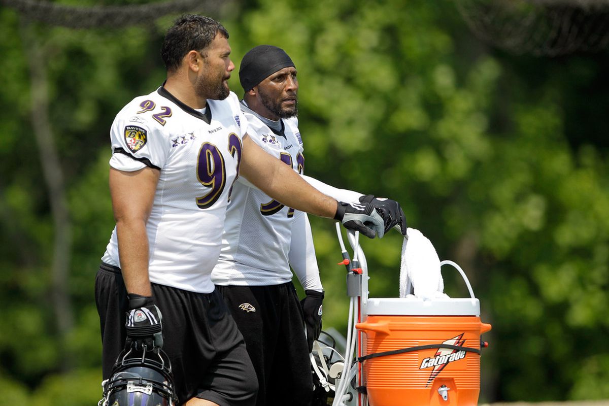 OWINGS MILLS, MD - JULY 29: Defensive tackle Haloti Ngata #92 and  linebacker Ray Lewis #52 of the Baltimore Ravens talk during training camp on July 29, 2011 in Owings Mills, Maryland.  (Photo by Rob Carr/Getty Images)