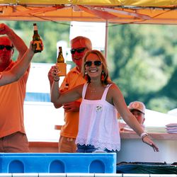 Tennessee fans cheer and wave from their house boat as they prepare for the game with BYU in Knoxville on Saturday, Sept. 7, 2019.