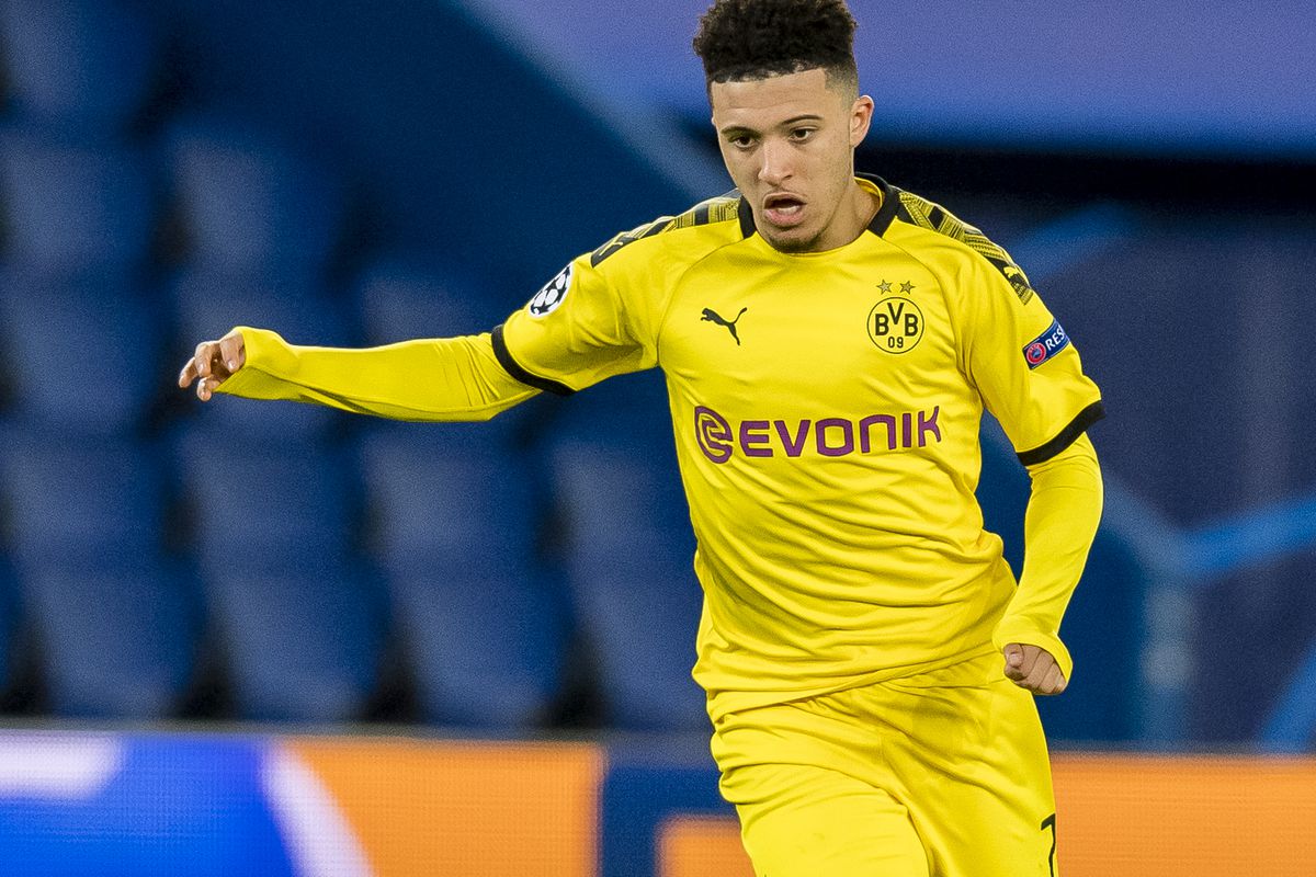 Jadon Sancho of Borussia Dortmund controls the ball during the UEFA Champions League round of 16 second leg match between Paris Saint-Germain and Borussia Dortmund at Parc des Princes on March 11, 2020 in Paris, France. The match is played behind closed doors as a precaution against the spread of COVID-19 (Coronavirus).