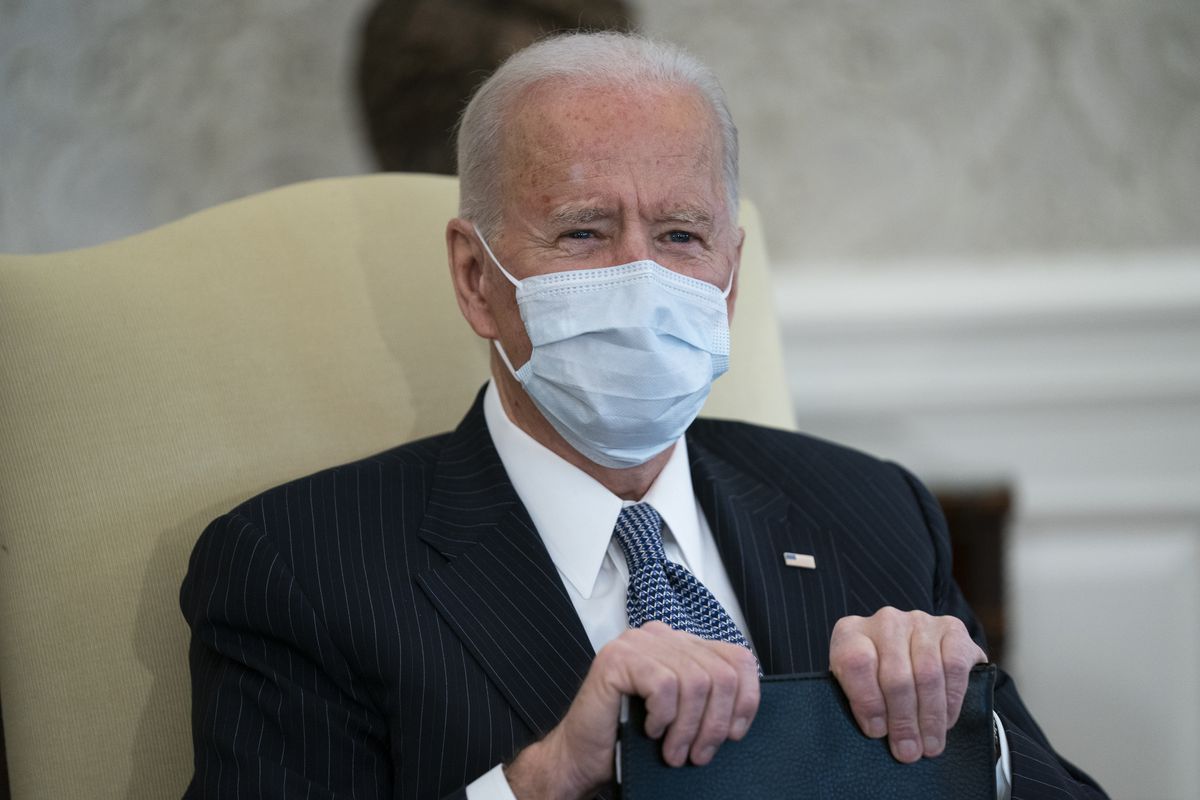 In this Feb. 3, 2021, file photo President Joe Biden meets with Senate Majority Leader Sen. Chuck Schumer of N.Y., and other Democratic lawmakers to discuss a coronavirus relief package, in the Oval Office of the White House in Washington. 