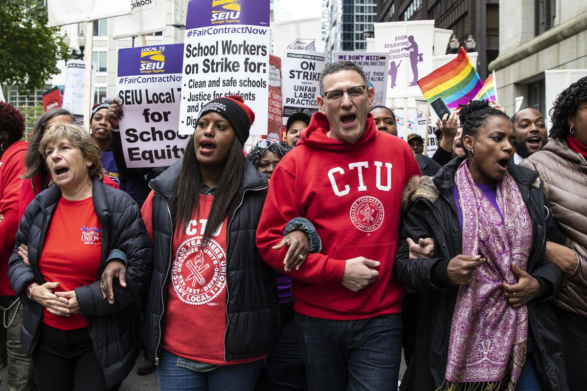 Chicago Teachers Union Vice President Stacy Davis Gates and CTU President Jesse Sharkey lead thousands of striking union members on a march through the Loop, Thursday afternoon, Oct. 17, 2019.