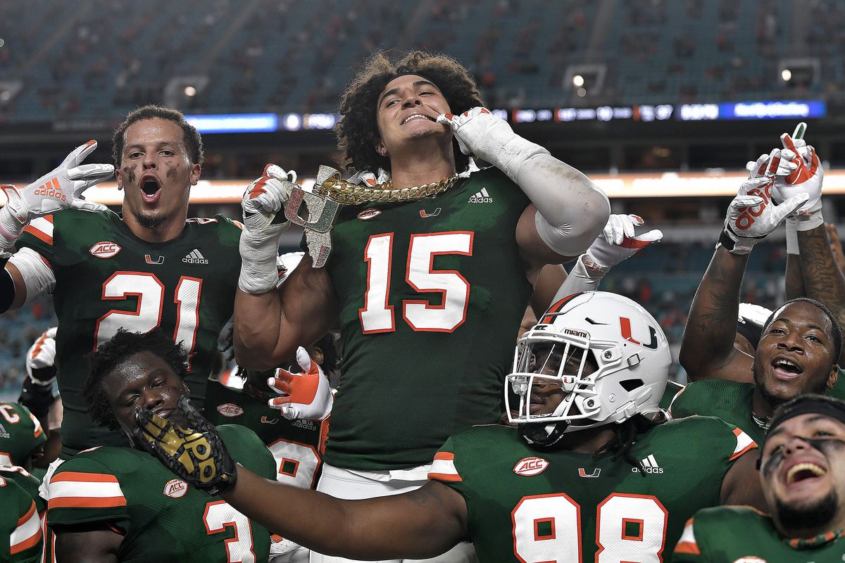 Miami lineman Jaelan Phillips displays the tunover chain after intercepting a Florida State pass during the first half of their game on Saturday, September 26, 2020.