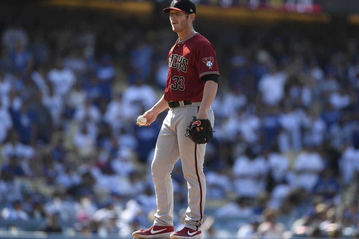 Relief pitcher J.B. Bukauskas #33 of the Arizona Diamondbacks stands on the mound&nbsp;during a day game at Dodger Stadium