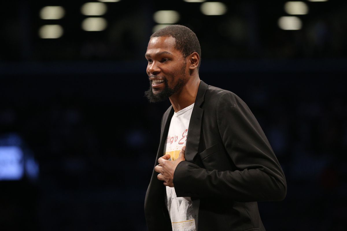 Brooklyn Nets small forward Kevin Durant smiles during a time out during the second quarter against the Phoenix Suns at Barclays Center.