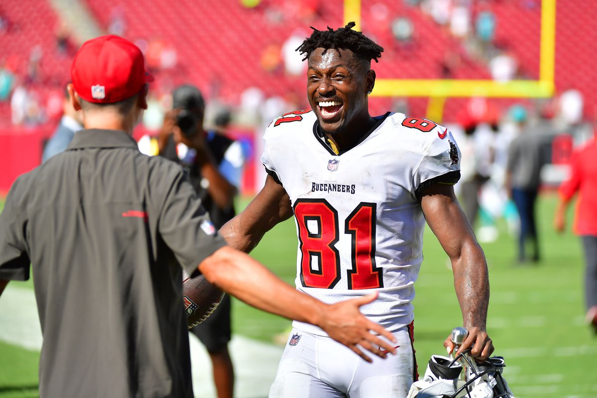 Antonio Brown #81 of the Tampa Bay Buccaneers celebrates after defeating the Miami Dolphins 45-17 at Raymond James Stadium on October 10, 2021 in Tampa, Florida.
