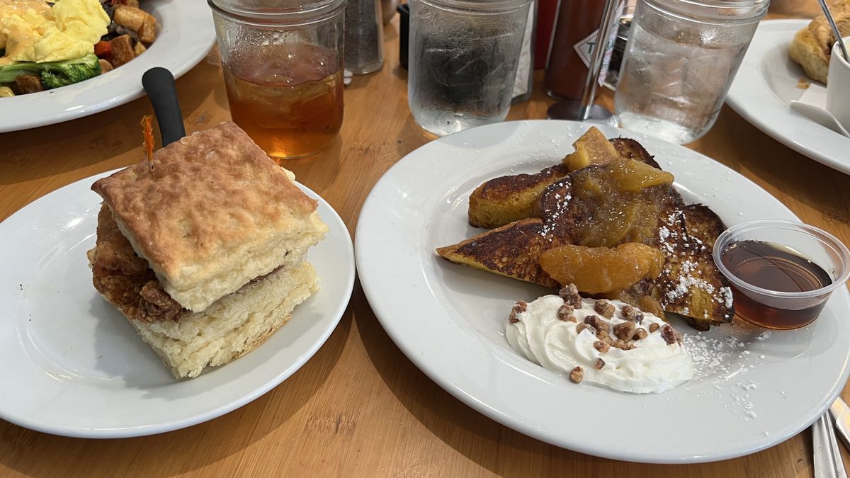 A meal of chicken biscuits, eggs and hash, and pecan French toast from Mama’s Boy in Athens GA. 