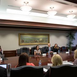 Independent presidential candidate Evan McMullin, back center, his running mate, Mindy Finn, back left, and Kelsey Koenen Witt, back right, the campaign's Utah communications director, meet with the Deseret News and KSL editorial board in Salt Lake City on Friday, Oct. 14, 2016.