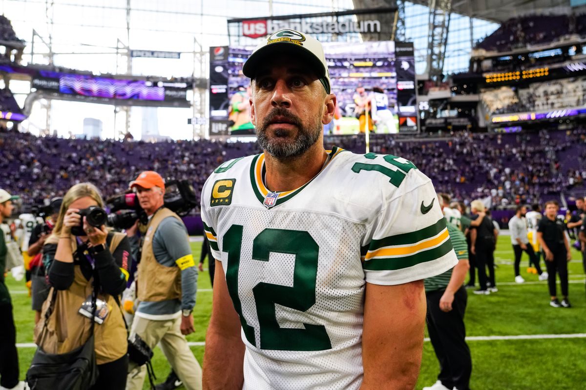 Aaron Rodgers #12 of the Green Bay Packers walks off the field after a loss to the Minnesota Vikings at U.S. Bank Stadium on September 11, 2022 in Minneapolis, Minnesota. The Vikings defeated the Packers 23-7.