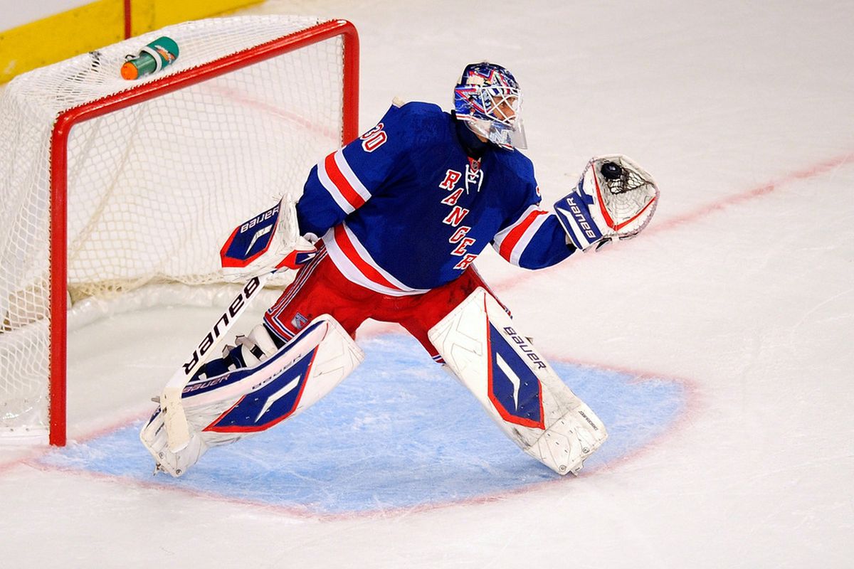 NEW YORK, NY - OCTOBER 27:  Henrik Lundqvist #30 of the New York Rangers makes a save against the Toronto Maple Leafs during the second period at Madison Square Garden on October 27, 2011 in New York City.  (Photo by Patrick McDermott/Getty Images)