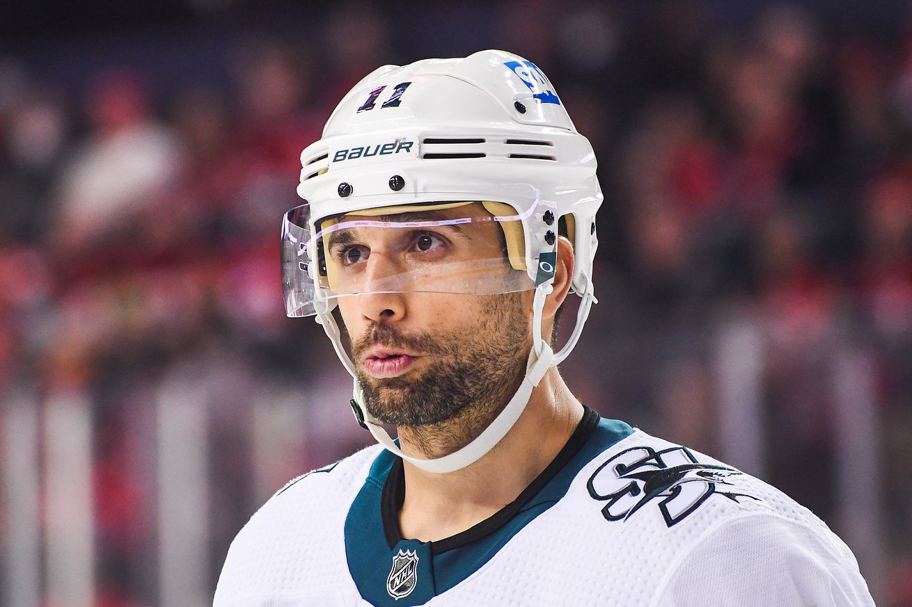 Andrew Cogliano #11 of the San Jose Sharks in action against the Calgary Flames during an NHL game at Scotiabank Saddledome on November 9, 2021 in Calgary, Alberta, Canada.