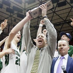 Olympus head coach Matt Barnes celebrates winning the 4A boys' basketball championship game against Timpview at the Huntsman Center in Salt Lake City, Saturday, March 5, 2016.