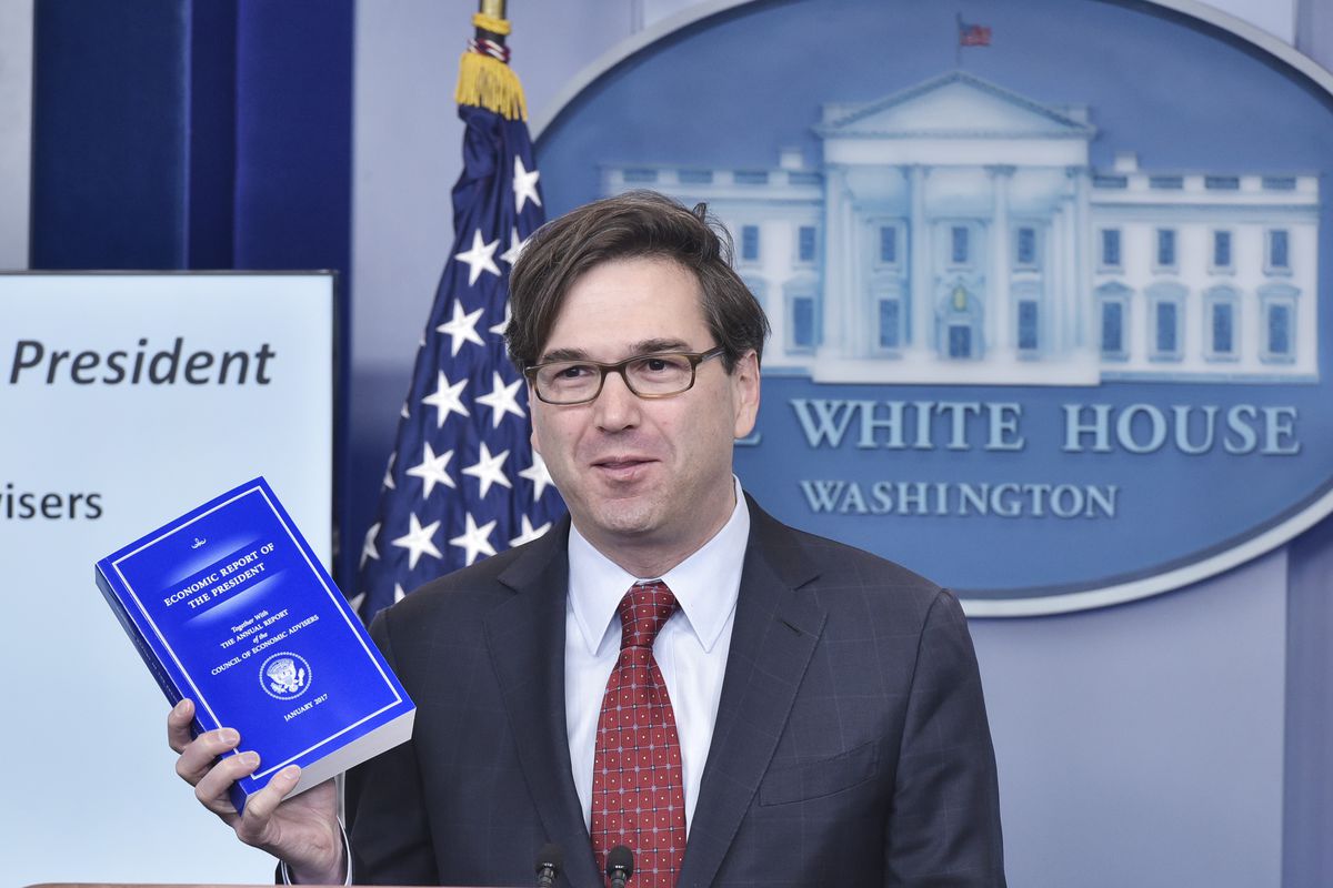 Jason Furman, Chairman of the Council of Economic Advisers, speaks at the White House in December — holding a copy of the council’s annual report.