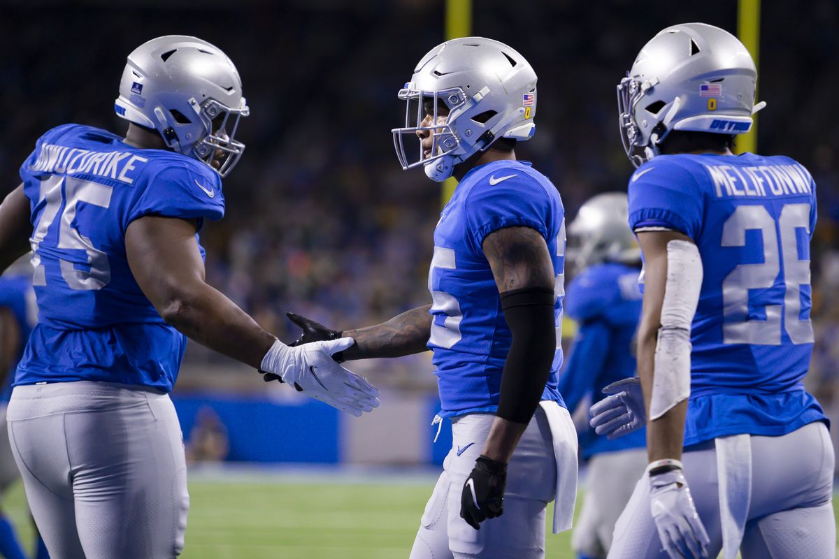 Detroit Lions safety Will Harris (25) gives five to defensive tackle Levi Onwuzurike (75) after a play during the fourth quarter against the Green Bay Packers at Ford Field.&nbsp;