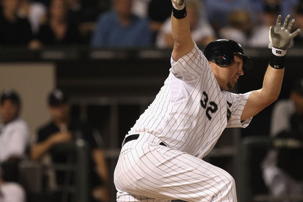Adam Dunn leaves 'em loaded in the eighth.