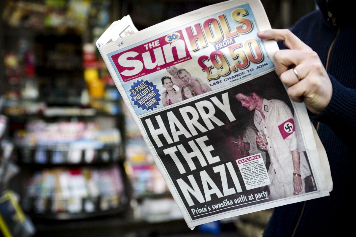 The British tabloid, The Sun, featured Prince Harry, 20, on its cover wearing a swastika armband, on January 13, 2005.