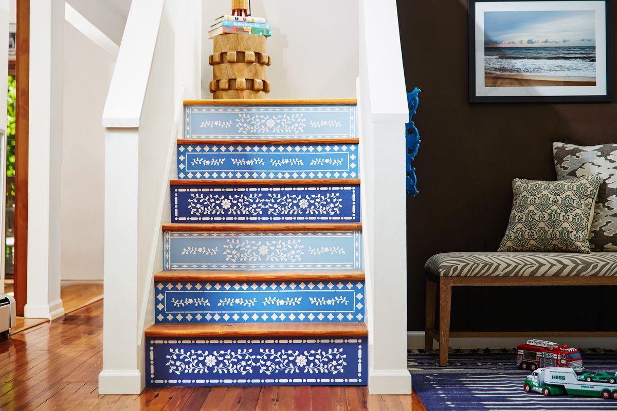Stairs painted with blue stencils