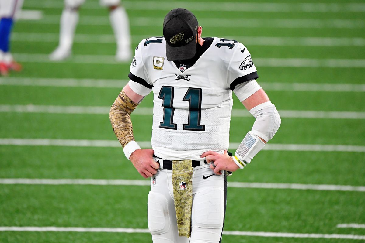 Philadelphia Eagles quarterback Carson Wentz (11) reacts after a play during the second half at MetLife Stadium.