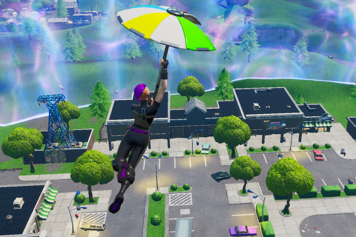 A Fortnite player gliding into the Retail Row
