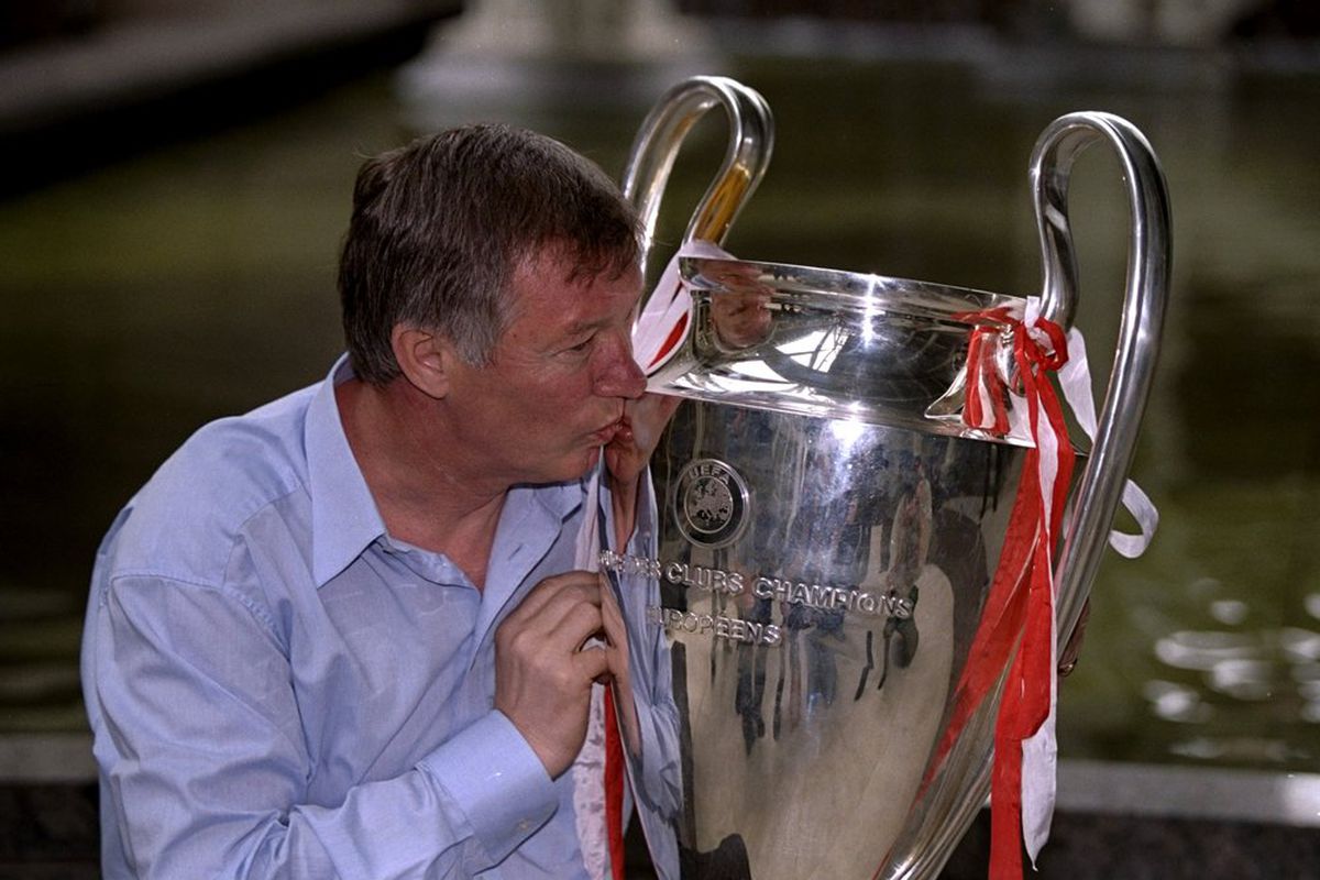 Sir Alex Ferguson kissing the European Cup after United's victory over Bayern Munich in the 1999 Champions League final